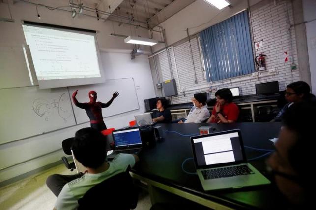 The Wider Image: Mexico's Spider-Moy teacher