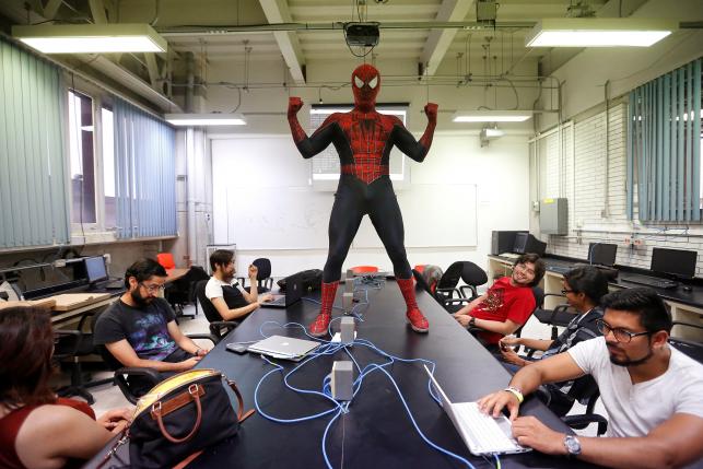 The Wider Image: Mexico's Spider-Moy teacher