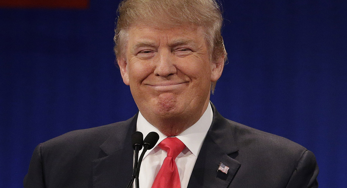 Republican presidential candidate, businessman Donald Trump stands during the Fox Business Network Republican presidential debate at the North Charleston Coliseum, Thursday, Jan. 14, 2016, in North Charleston, S.C. (AP Photo/Chuck Burton)