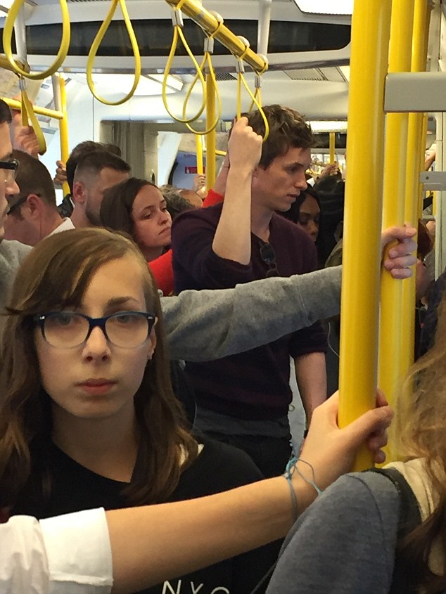 Eddie Redmayne on eastbound Circle line with wife Hannah.