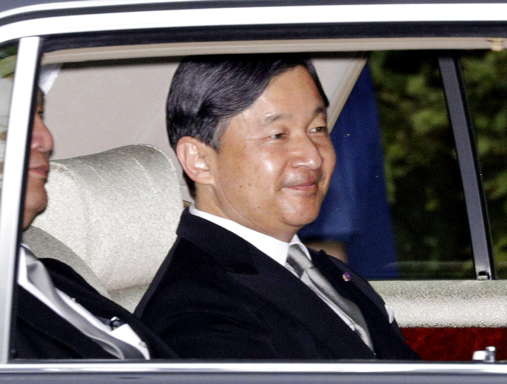 Japan\'s Crown Prince Naruhito, in a car, returns to the Crown Prince\'s Palace in Tokyo Tuesday, April 30, 2019. Japan\'s 85-year-old Emperor Akihito ends his three-decade reign on Tuesday and his son Crown Prince Naruhito will ascend to the Chrysanthemum Throne on Wednesday. (Yuta Omori/Kyodo News via AP)