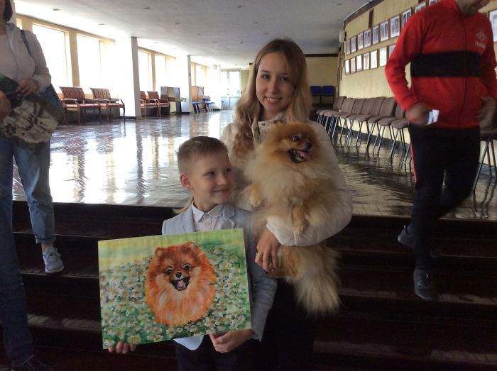 9-year-old-Russian-boy-trades-his-art-for-abandoned-dog-food-and-medicine-5da5173269e0d__700