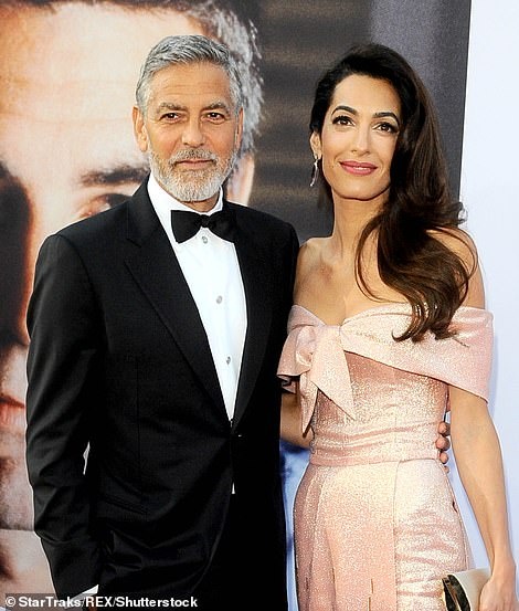 24994662-8026437-George_and_Amal_Clooney_in_Los_Angeles_in_June_2018-m-96_1582270599004.jpg